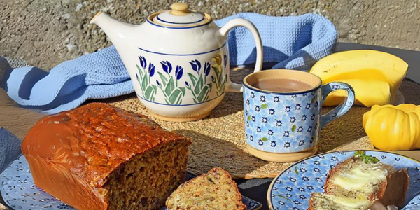 Nicholas Mosse pottery light blue lawn large mug and blue blooms teapot outdoors on table with banana bread